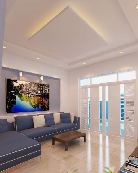 Phòng khách nổi bật với sofa màu xanh dương và tường âm trang trí