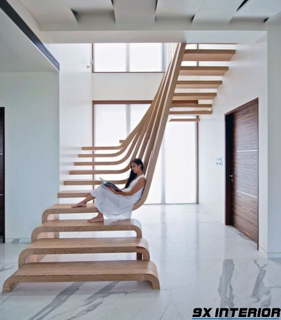 Cách bố trí cầu thang trong không gian phòng khách mang lại giá trị thẩm mỹ cho không gian sống của gia đình